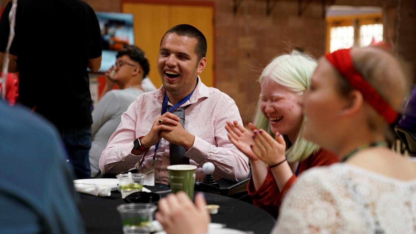 Employability Breakfast table 3 students laugh