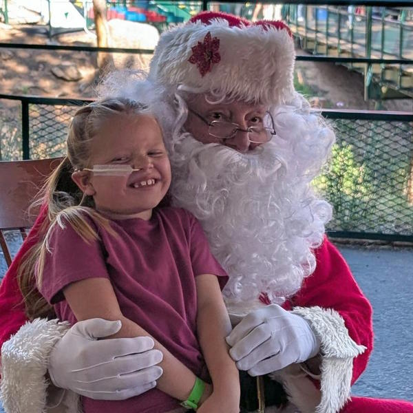 A student poses with Santa