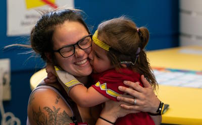 Preschool Parent and Child Hugging