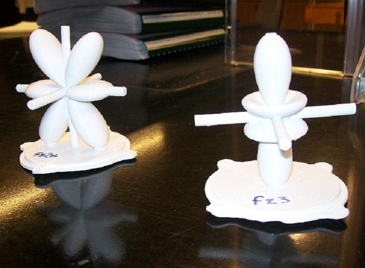 two 3d printed image of atomic orbitals 