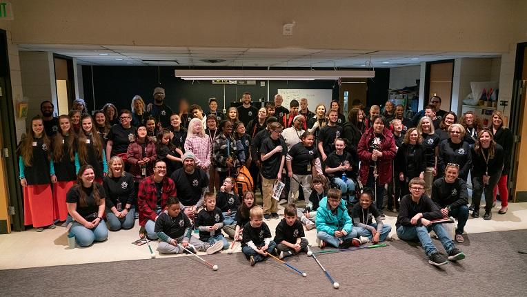 group photo of students, staff and volunteers