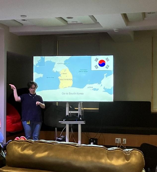 Student presents with a map on the screen