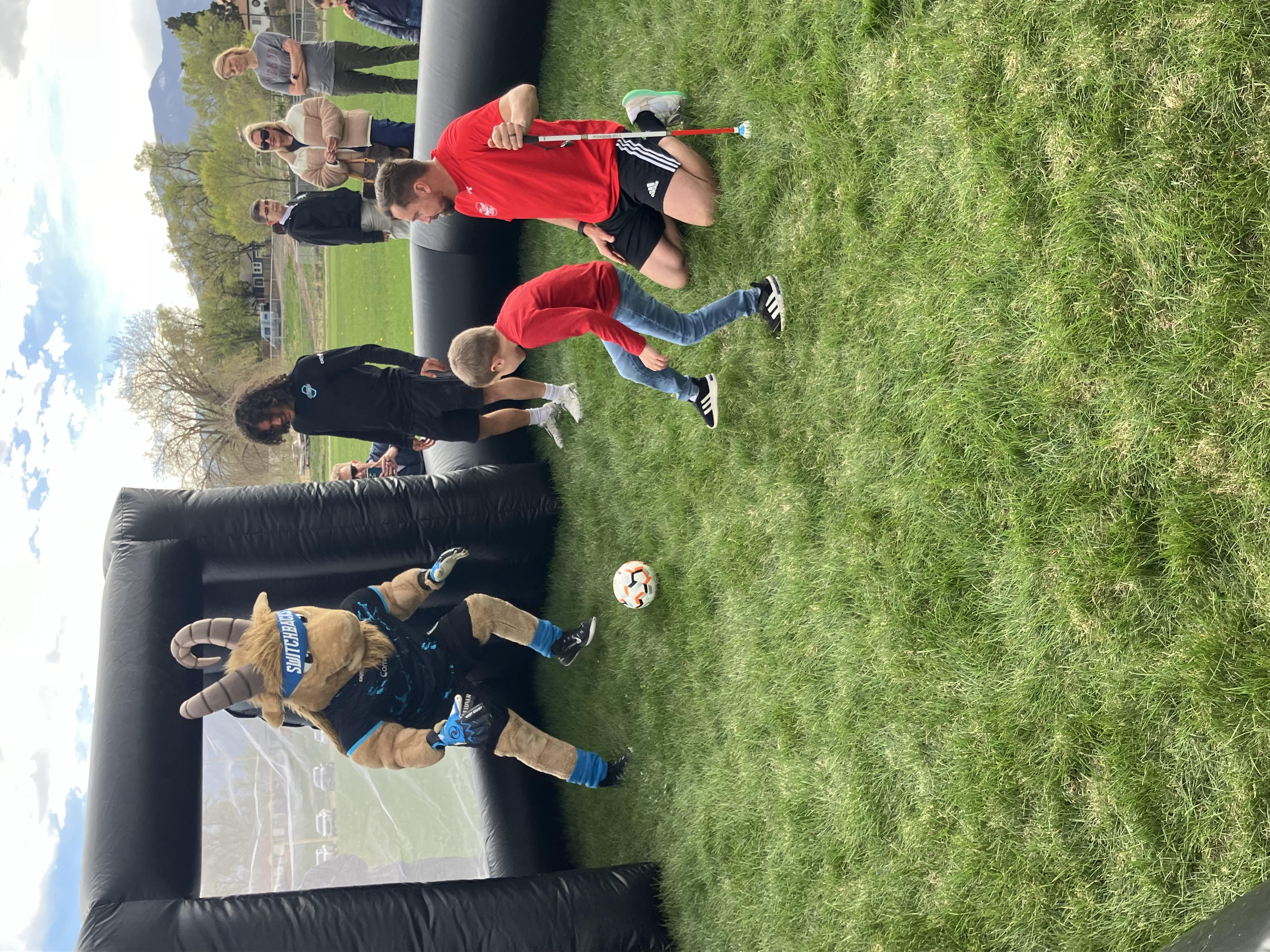 Switchback mascot goalie misses the kick from the boy