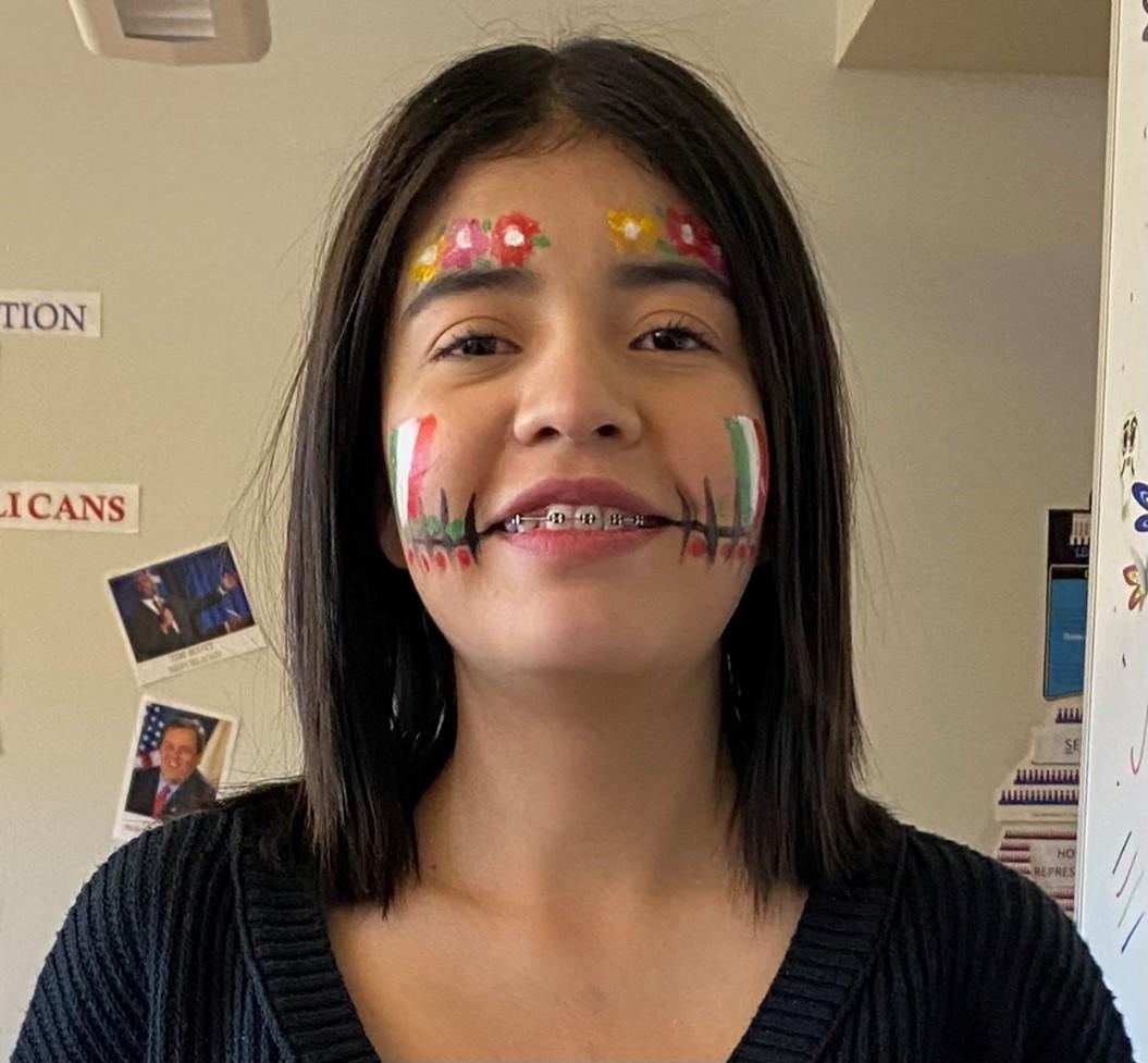 girl in face paint of Day of the Deaf