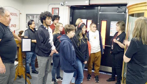 a group of student explore the history musuem