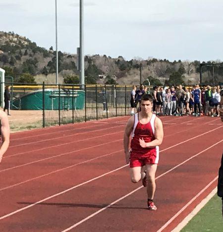Student racing in track meet