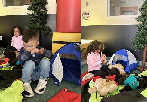  two preschool students, who are blind, explore sleeping bags and a tent with their stuffed animals.