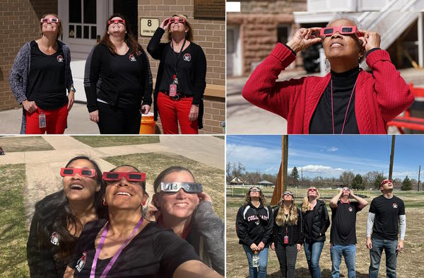 CSDB staff wearing eclipse glasses looking up and viewing the partial solar eclipse on April 8,2024