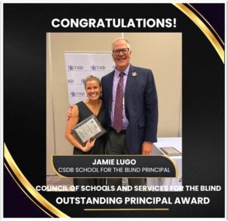 Jamie, holding award plaque, standing with Brian Darcy, COSB President; Text: Congratulations! Jamie Lugo CSDB School for the Blind Principal, Council of Schools and Services for the Blind Outstanding Principal Award