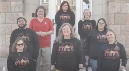 VIBE Team Members on Steps of Admin Building