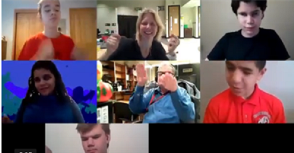 Zoom collage of 5 students and 2 adults reacting to music