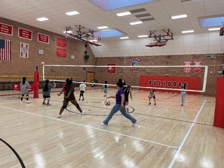 The volleyball team practicing in the CSDB gym.